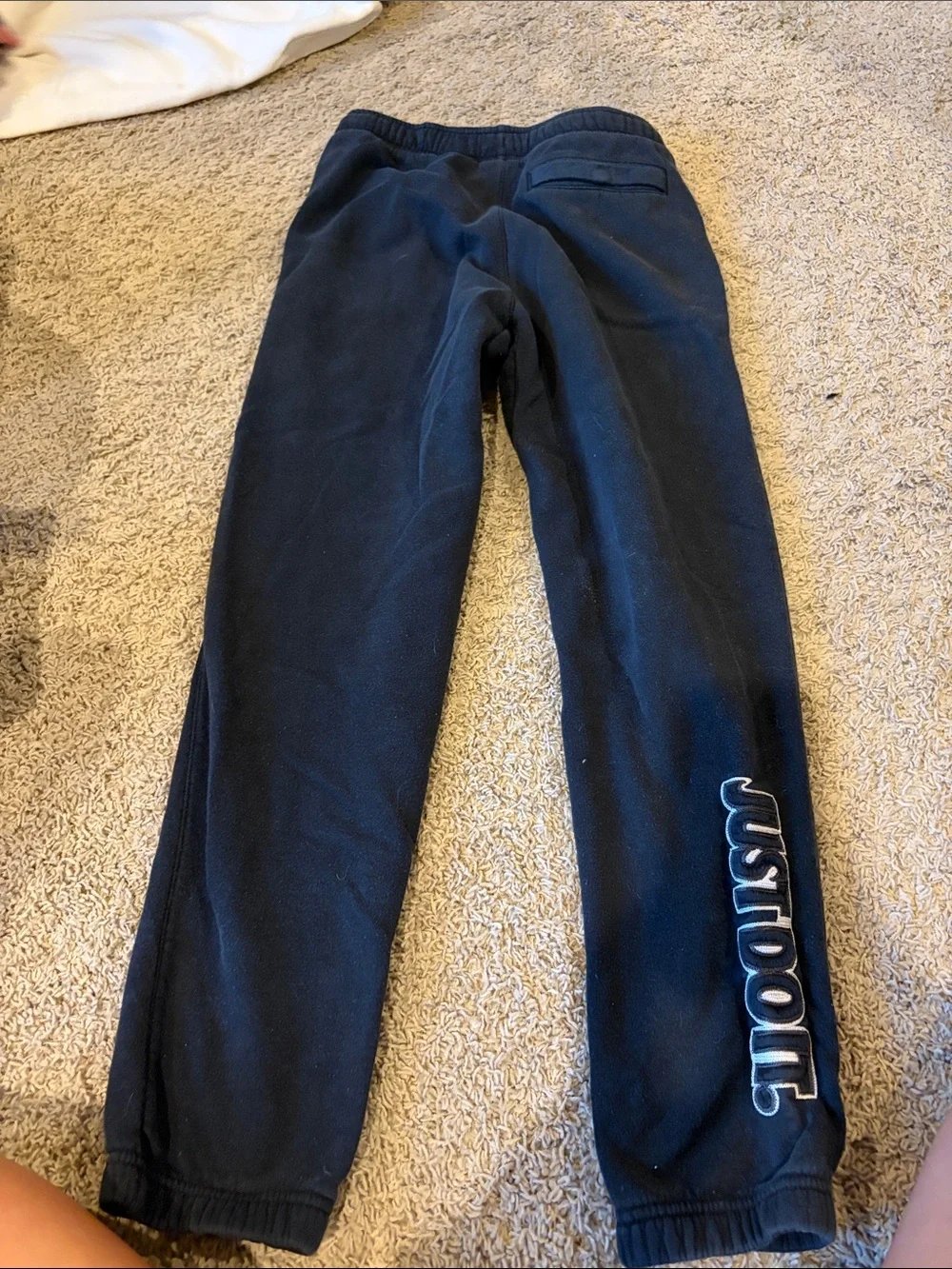 Nike Kids Black Jogger Sweatpants with White Swoosh